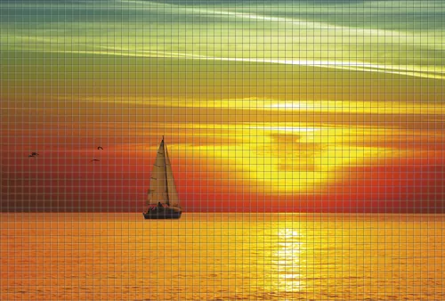 Парусник на фоне заката